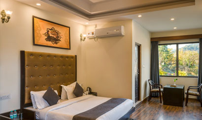 Luxury Boutique Resort in Corbett Ramnagar with scenic forest and river views